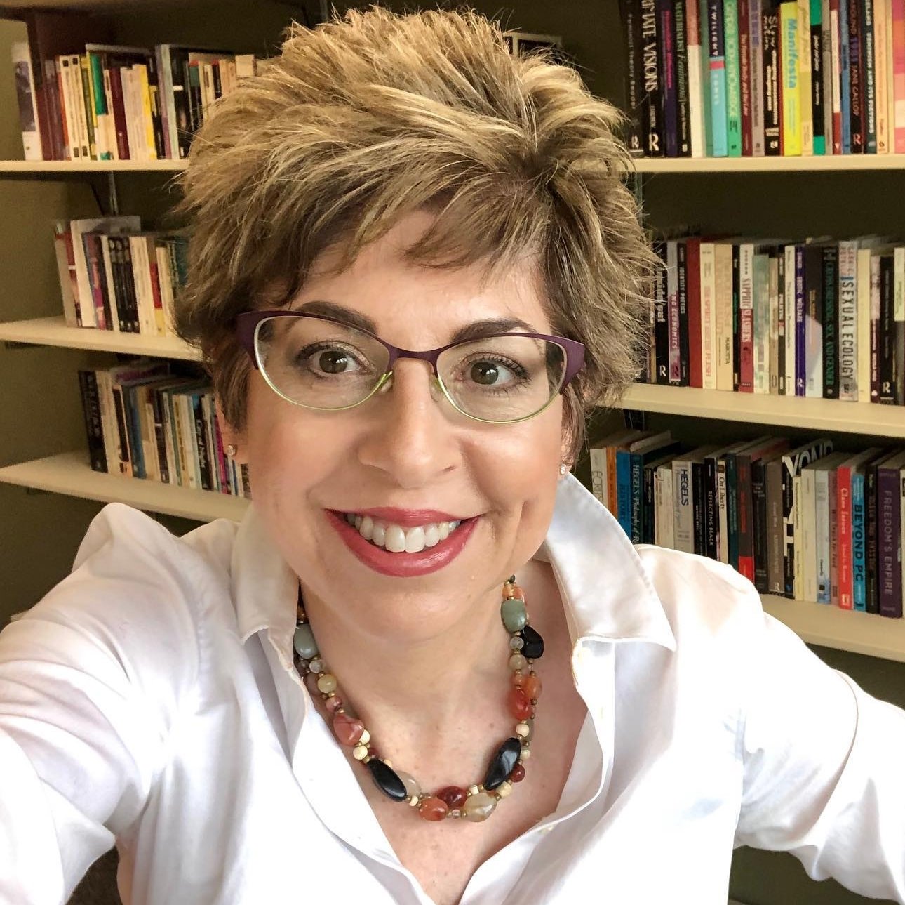 Dr. Elisa GLick